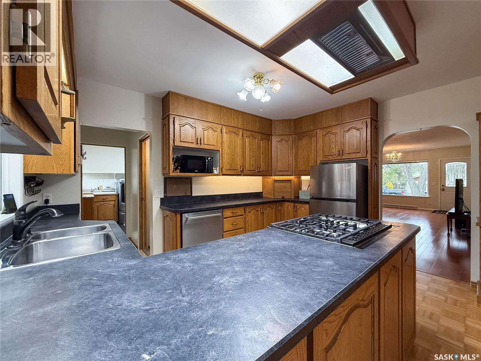 220 1St Street W, Ponteix, SK - Indoor Photo Showing Kitchen With Double Sink