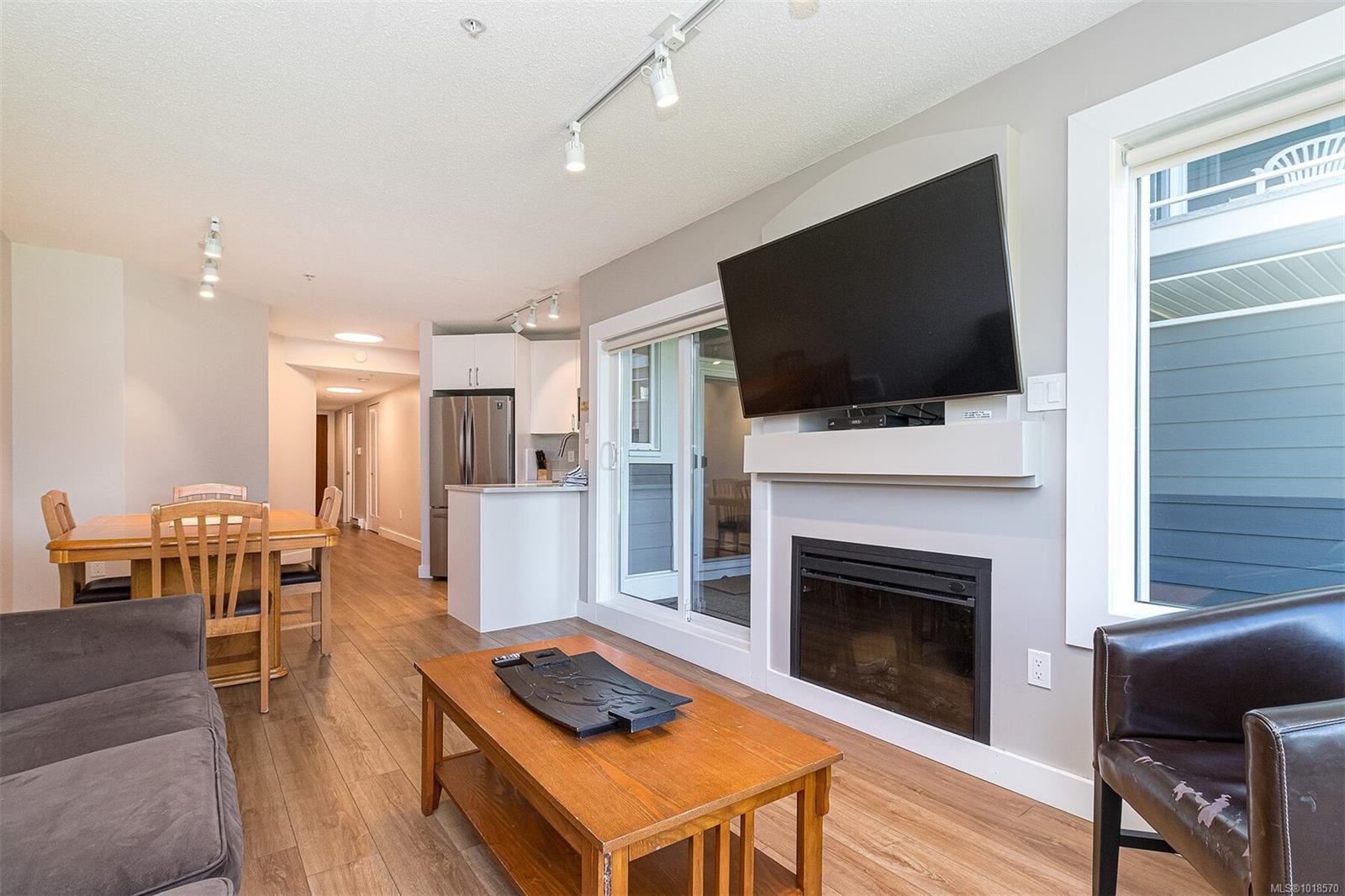 717-1600 Stroulger Rd, Nanoose Bay, BC - Indoor Photo Showing Living Room With Fireplace