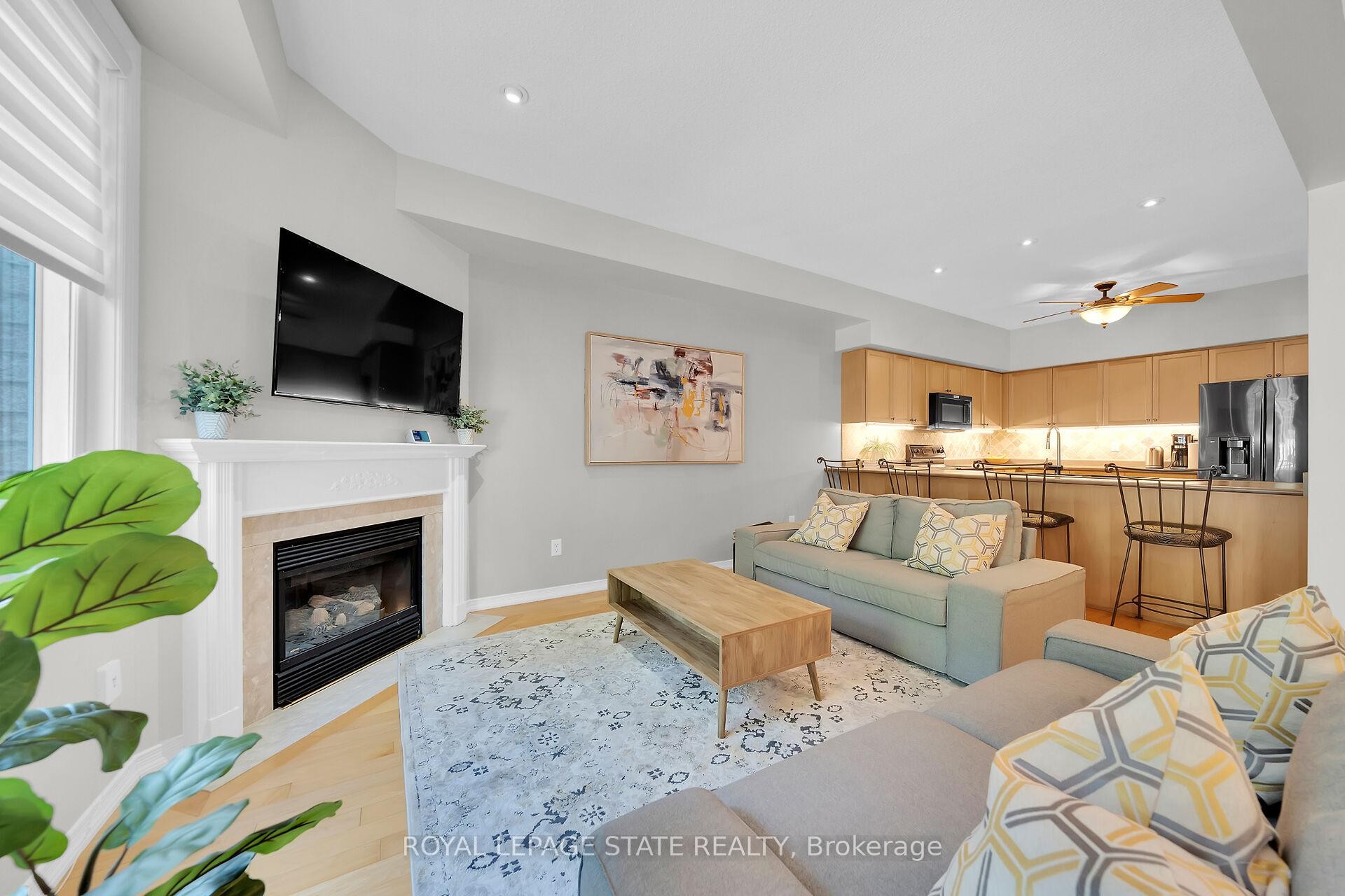 36-81 Valridge Drive, Hamilton, ON - Indoor Photo Showing Living Room With Fireplace