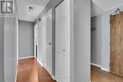 Storage closet and hallway to Bedrooms/Bathrooms -