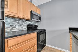 Kitchen w/prep space beside stove -