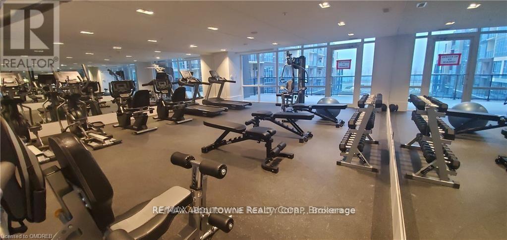 gym with views of the lake - 505 - 16 Concord Place, Grimsby, ON - Indoor Photo Showing Gym Room