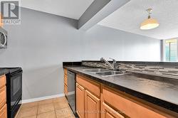 Kitchen overlooks Dining area and Living Room -