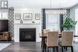 Gas Fireplace between Living and Dining -