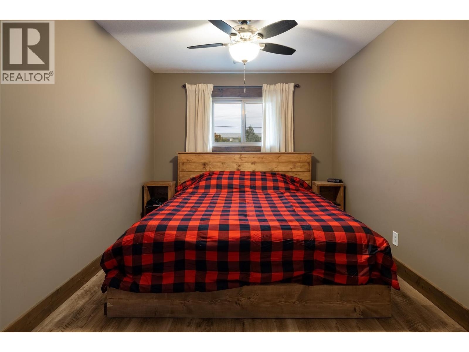 Master bedroom - 6454 Holbrook Road, Vernon, BC - Indoor Photo Showing Bedroom
