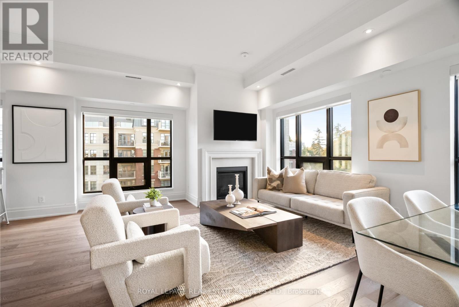 504 - 4 The Kingsway, Toronto, ON - Indoor Photo Showing Living Room With Fireplace