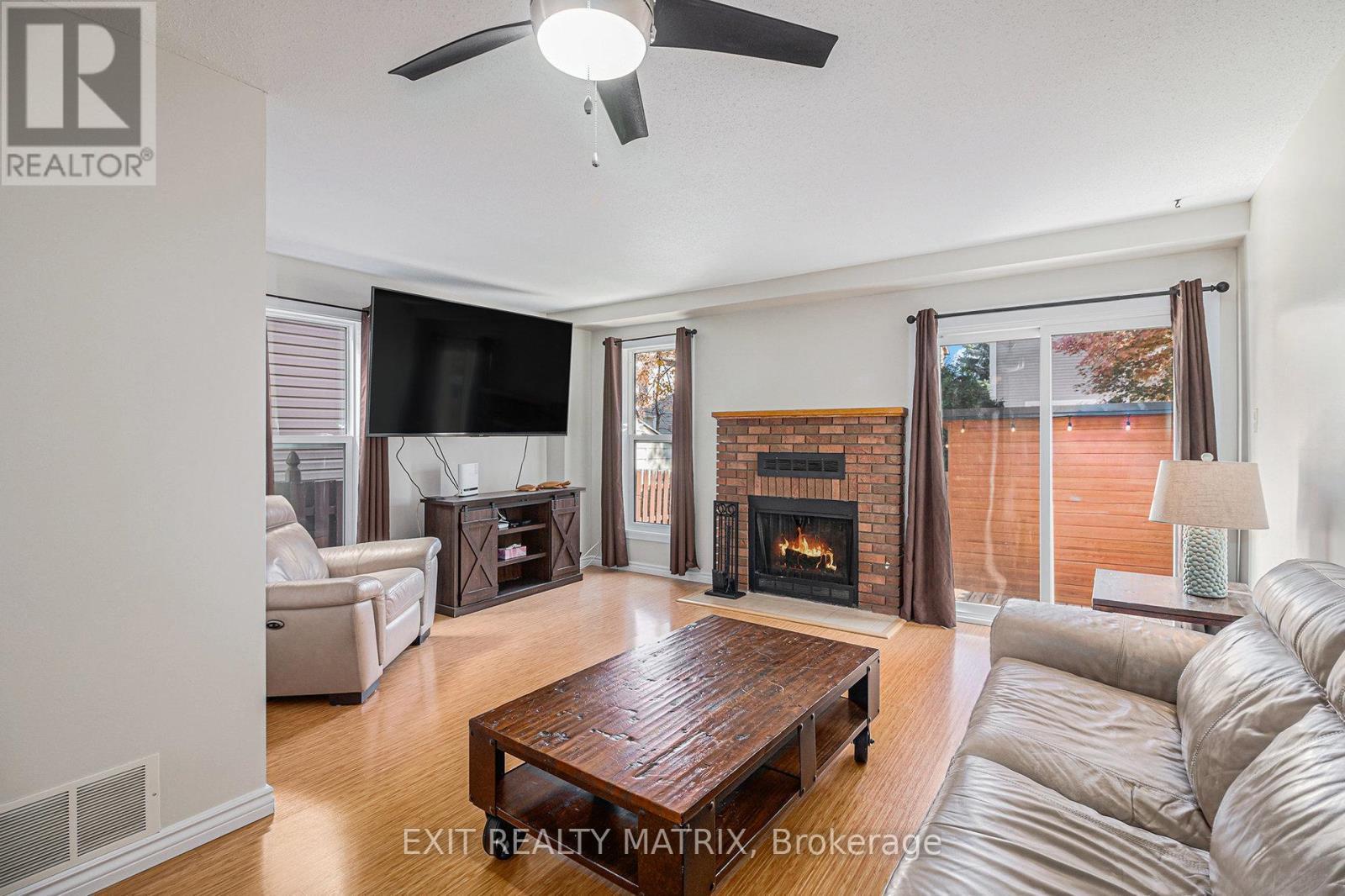 1432 Deavy Way E, Ottawa, ON - Indoor Photo Showing Living Room With Fireplace