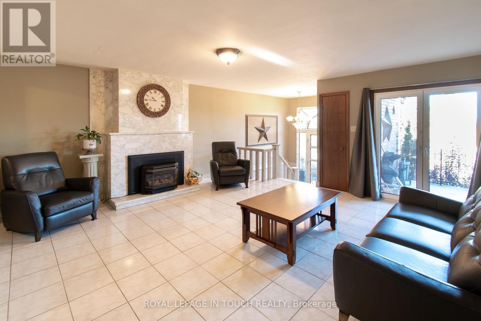 21 Robins Point Road, Tay, ON - Indoor Photo Showing Living Room With Fireplace