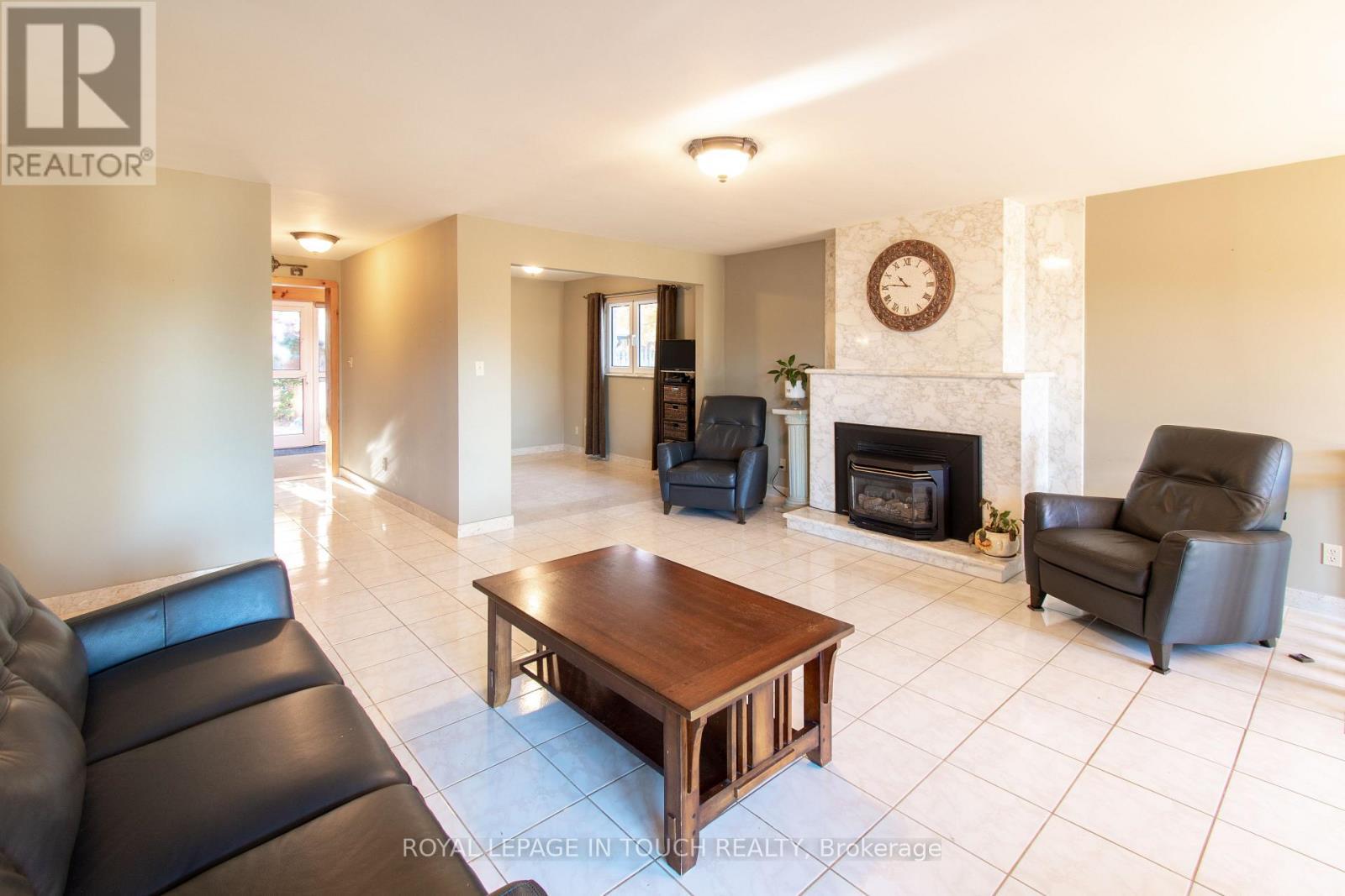 21 Robins Point Road, Tay, ON - Indoor Photo Showing Living Room With Fireplace