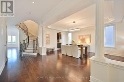 open area in foyer dining and living area -