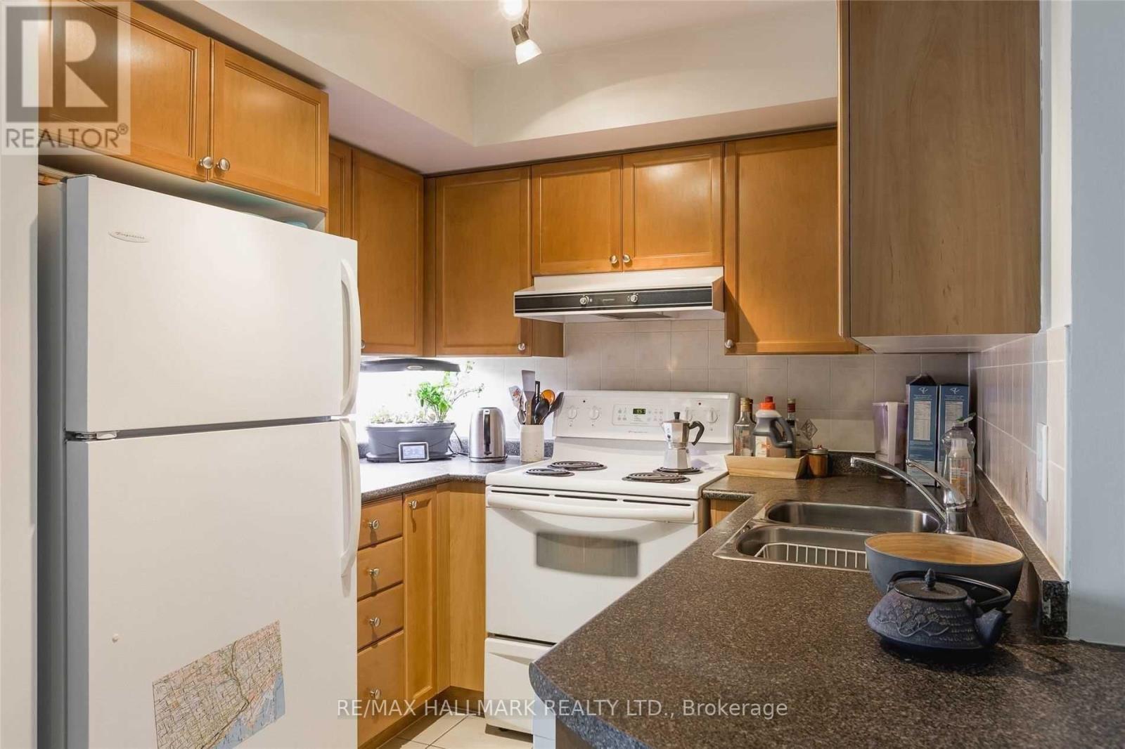 1113 - 17 Barberry Place, Toronto, ON - Indoor Photo Showing Kitchen With Double Sink