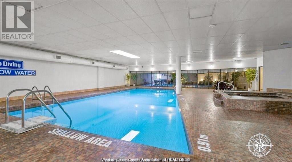 380 Pelissier Unit# 307, Windsor, ON - Indoor Photo Showing Other Room With In Ground Pool