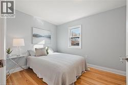 Bedroom with light wood-style flooring -