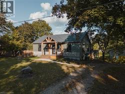 Bungalow-style home featuring covered porch -