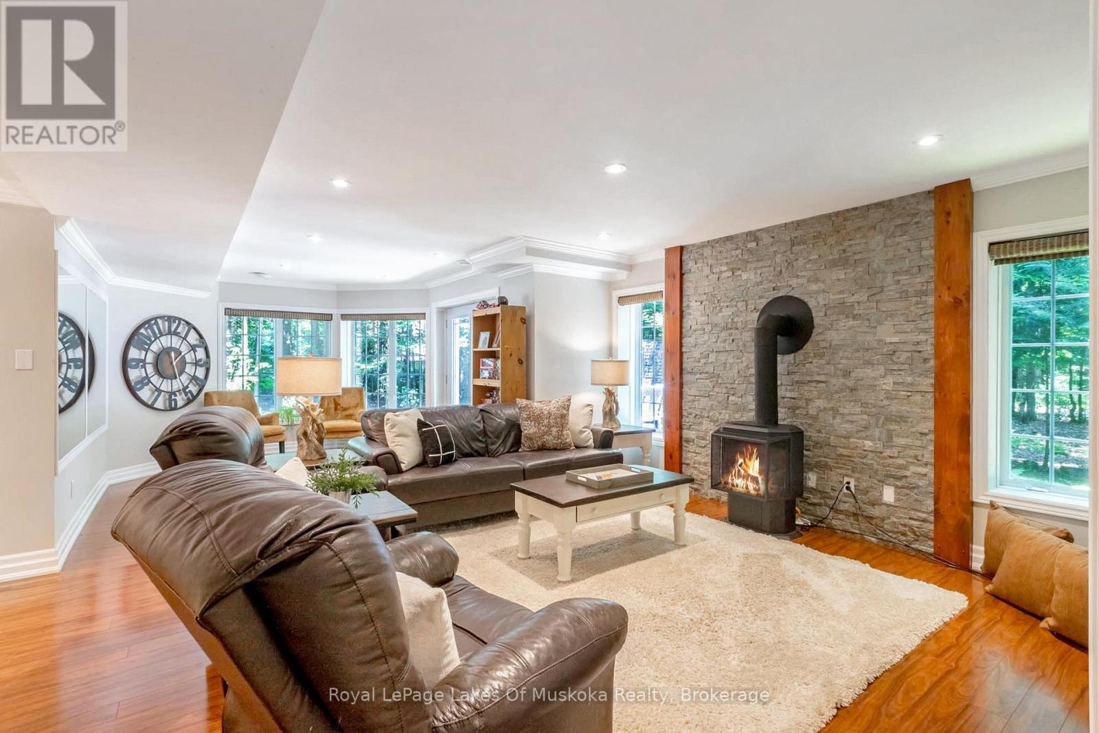 24 Birchwood Crescent, Huntsville (Brunel), ON - Indoor Photo Showing Living Room With Fireplace