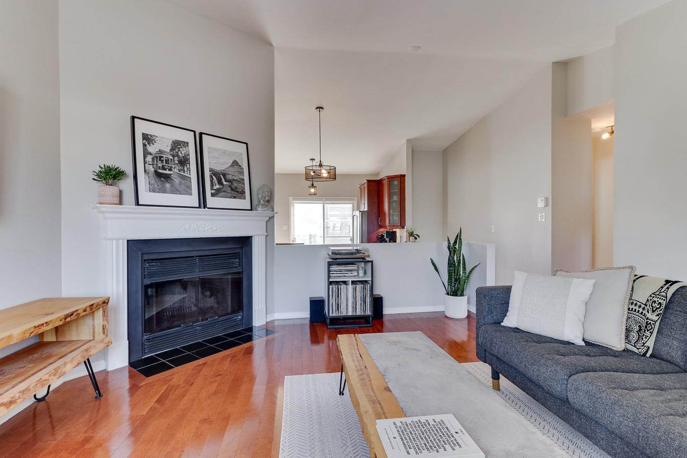 Salon - 7588 Rue François-Chartrand, Laval (Duvernay), QC - Indoor Photo Showing Living Room With Fireplace