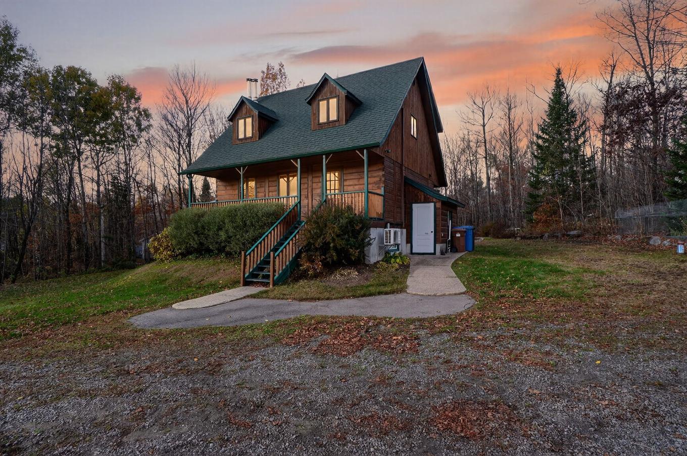 Façade - 580Z Ch. De La Carrière, Saint-Hippolyte, QC - Outdoor With Deck Patio Veranda