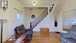Living room and stairs to second level -