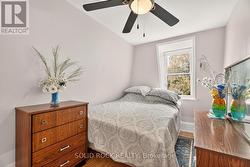 First bedroom with dormer windows. -