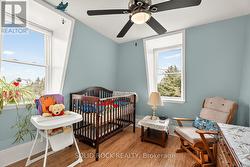 Third bedroom with two dormer windows. -