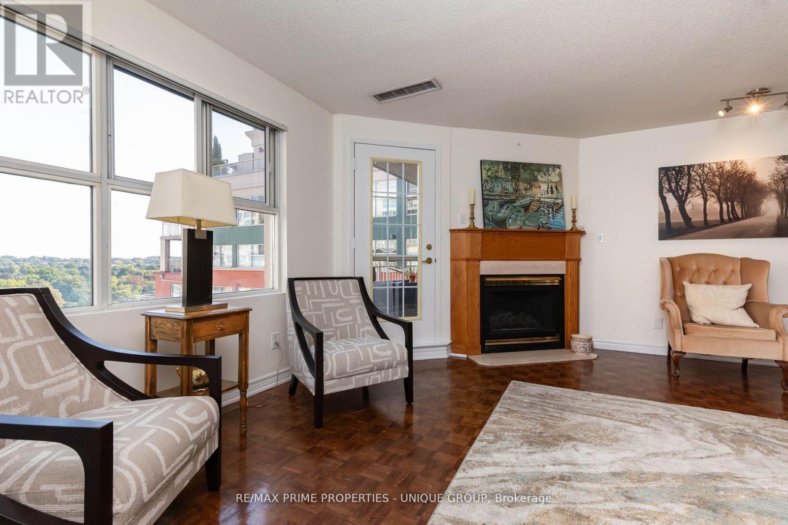808 - 18 Concorde Place, Toronto, ON - Indoor Photo Showing Living Room With Fireplace