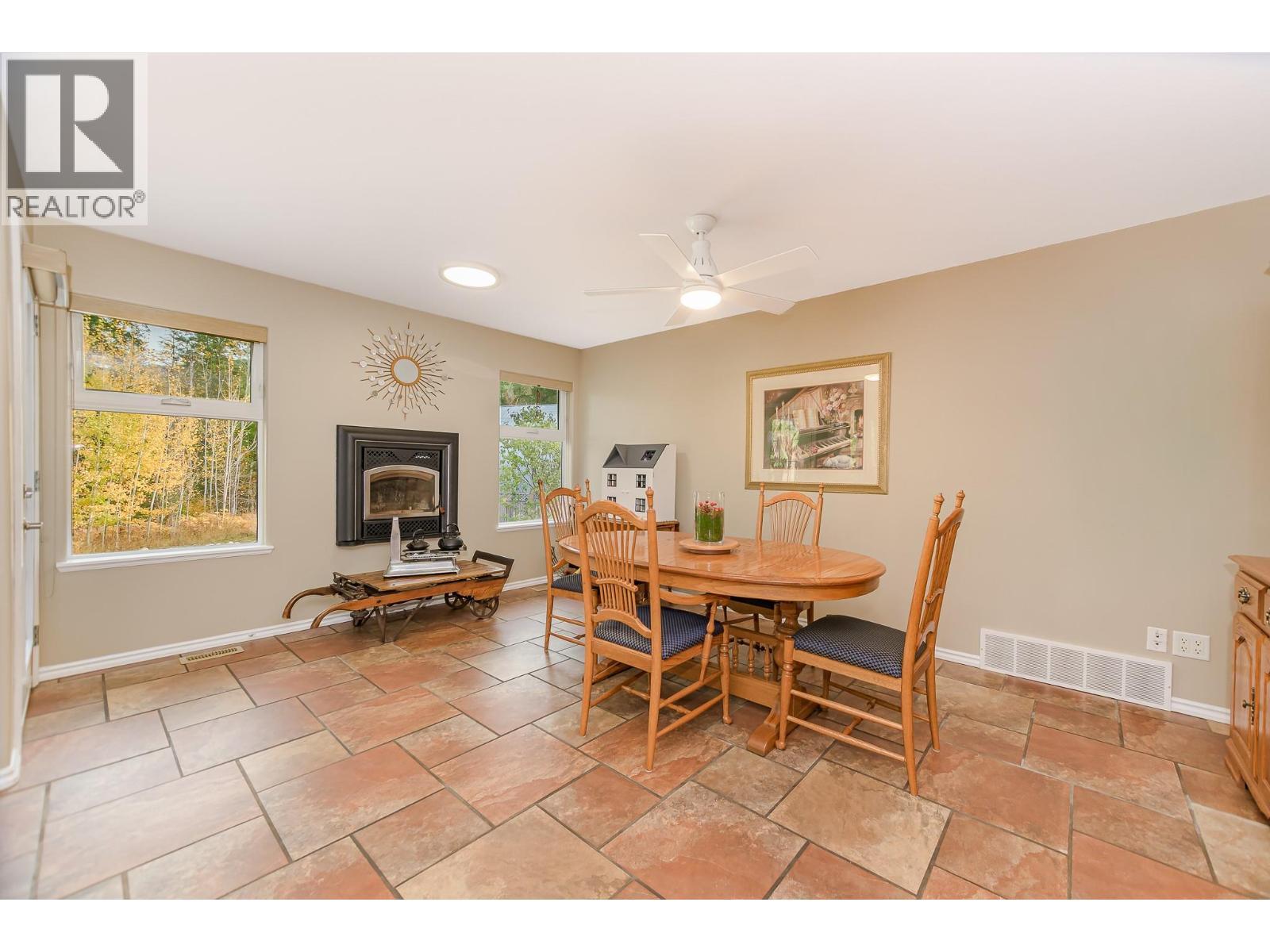 15 Parsons Road, Mara, BC - Indoor With Fireplace