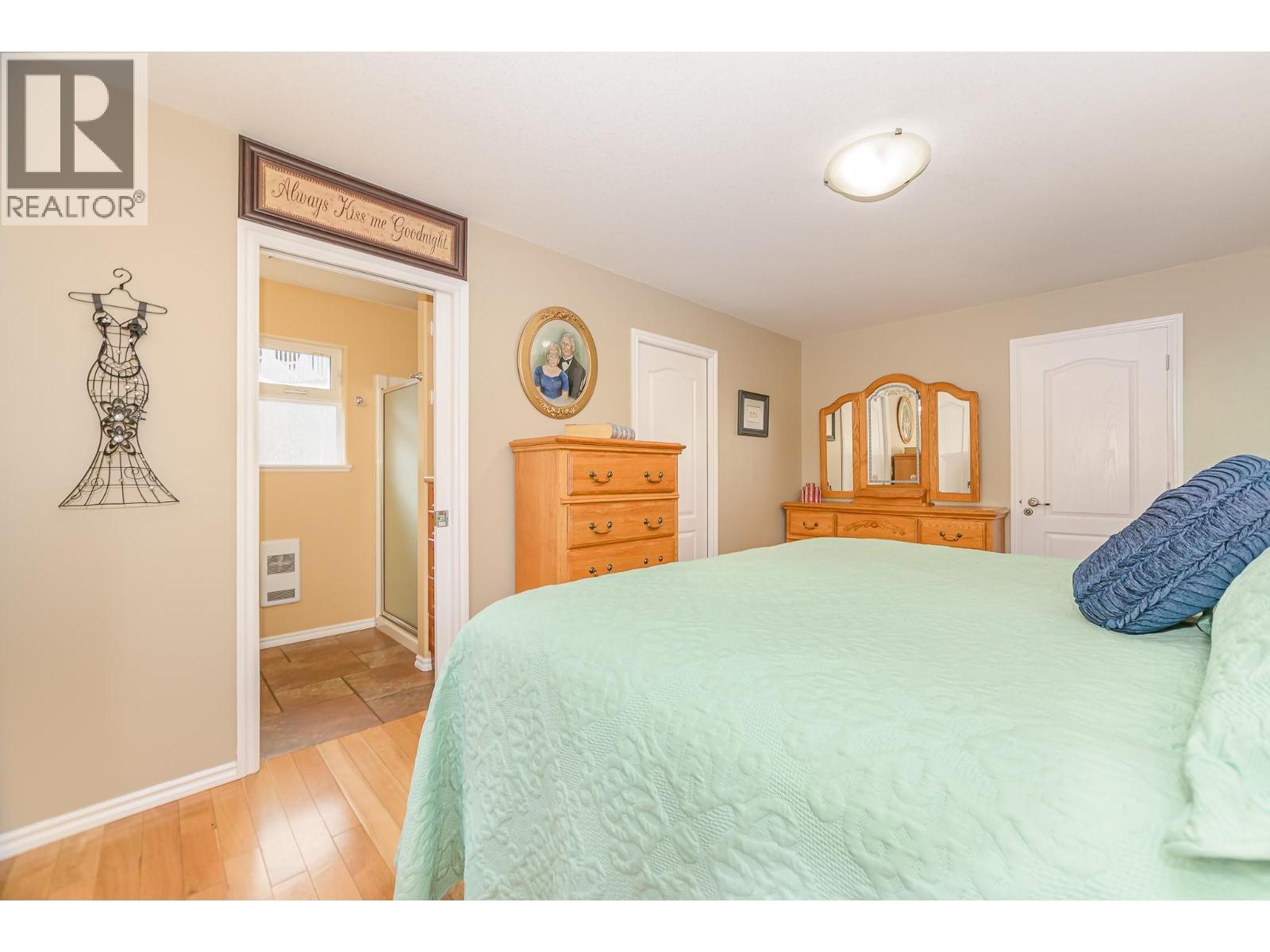 15 Parsons Road, Mara, BC - Indoor Photo Showing Bedroom