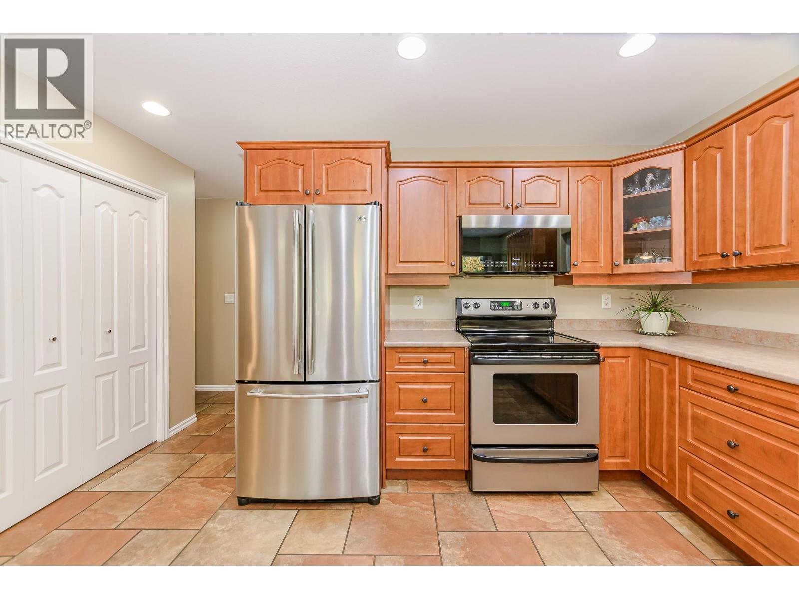 15 Parsons Road, Mara, BC - Indoor Photo Showing Kitchen With Stainless Steel Kitchen