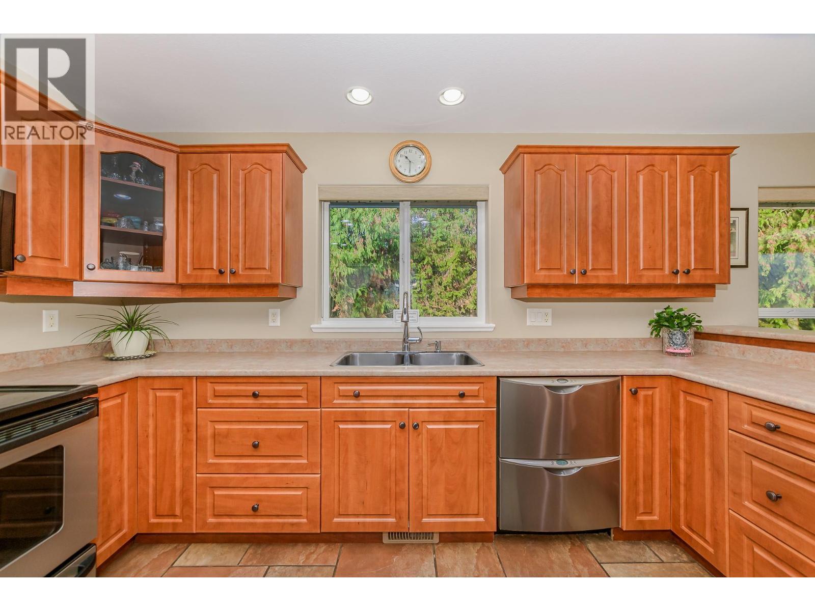 15 Parsons Road, Mara, BC - Indoor Photo Showing Kitchen With Double Sink