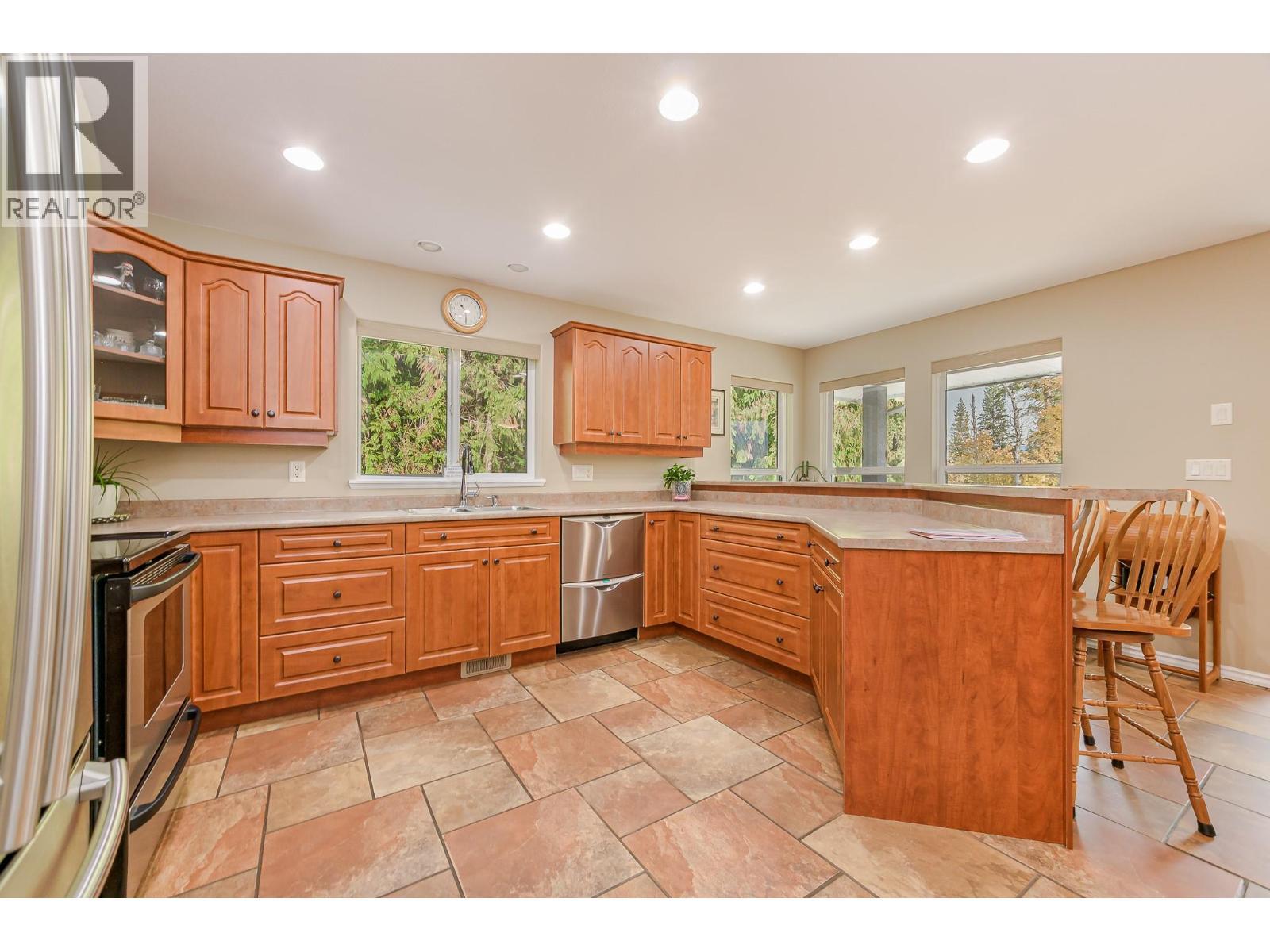 15 Parsons Road, Mara, BC - Indoor Photo Showing Kitchen With Double Sink
