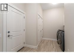 laundry with additional storage -