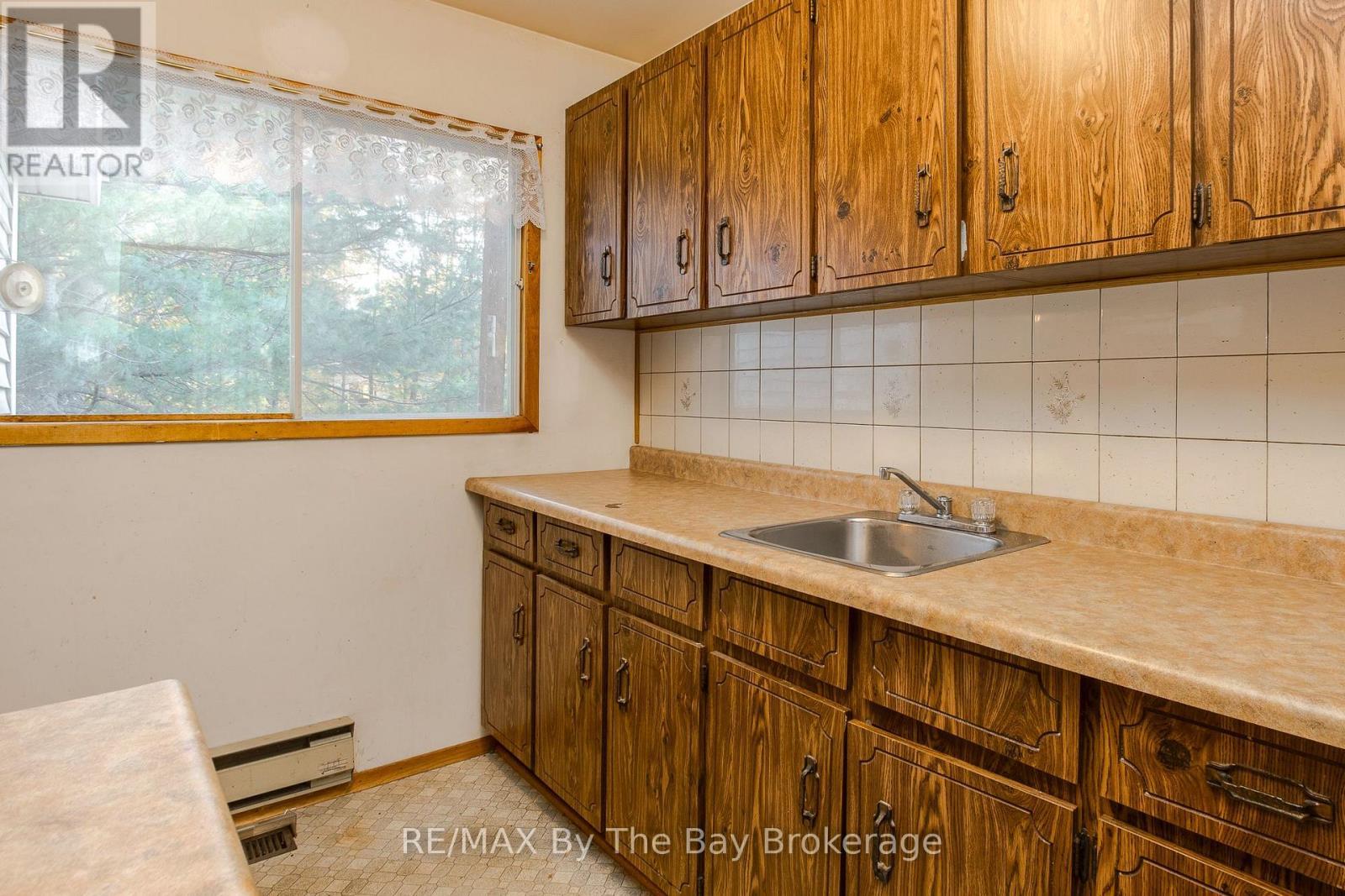 kitchen - 57 Tall Pines Drive, Tiny, ON - Indoor Photo Showing Kitchen