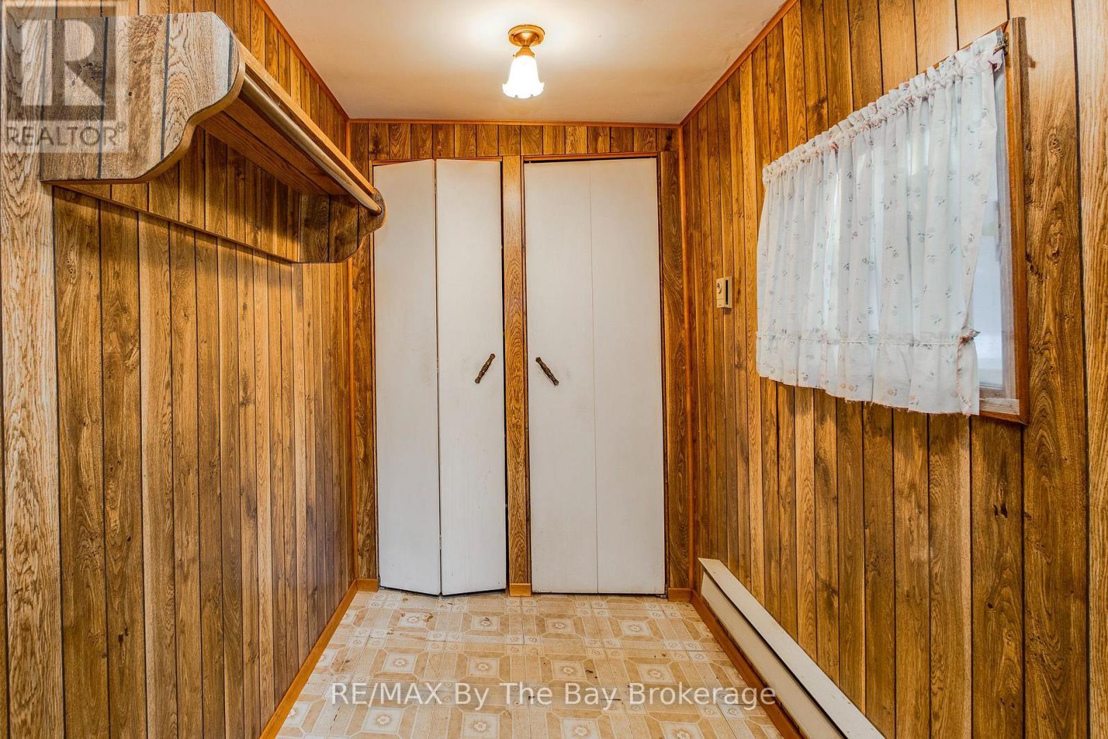 mudoom - 57 Tall Pines Drive, Tiny, ON - Indoor Photo Showing Other Room