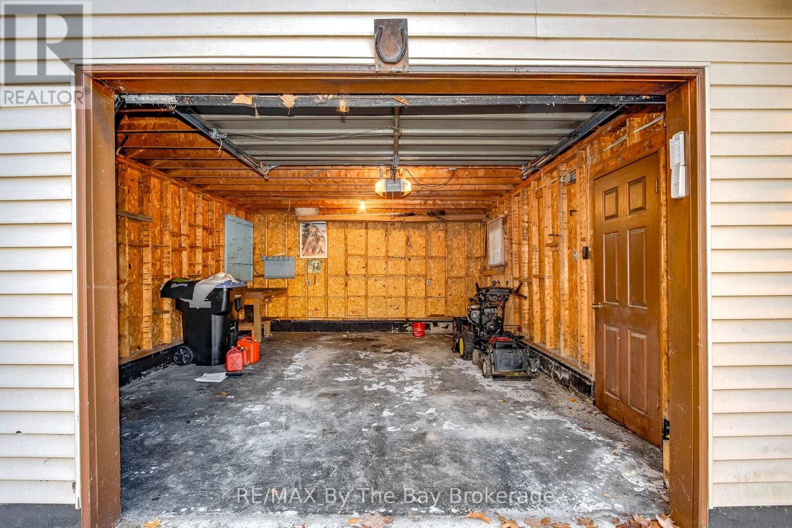 57 Tall Pines Drive, Tiny, ON - Indoor Photo Showing Garage