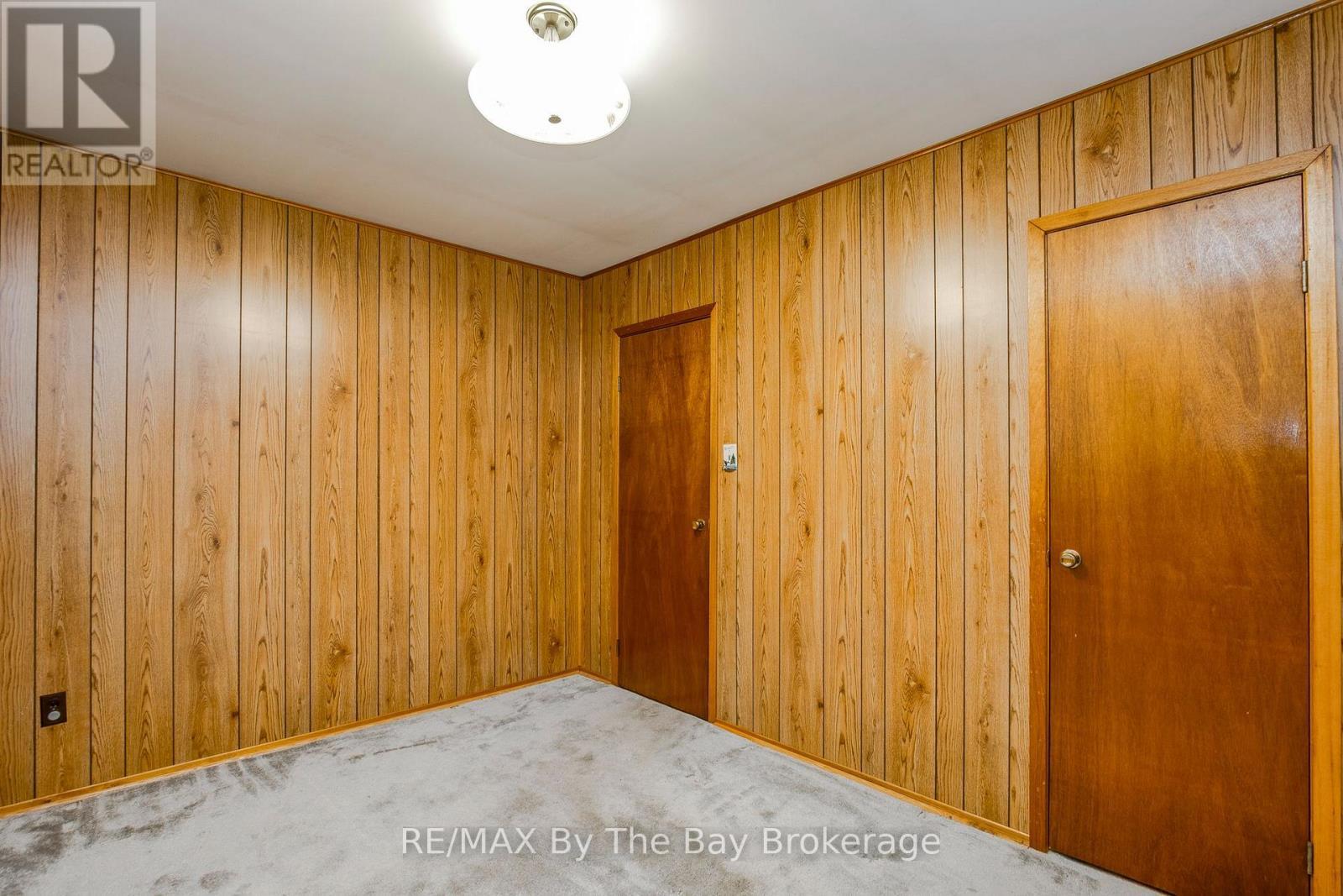 Bdrm - 57 Tall Pines Drive, Tiny, ON - Indoor Photo Showing Other Room