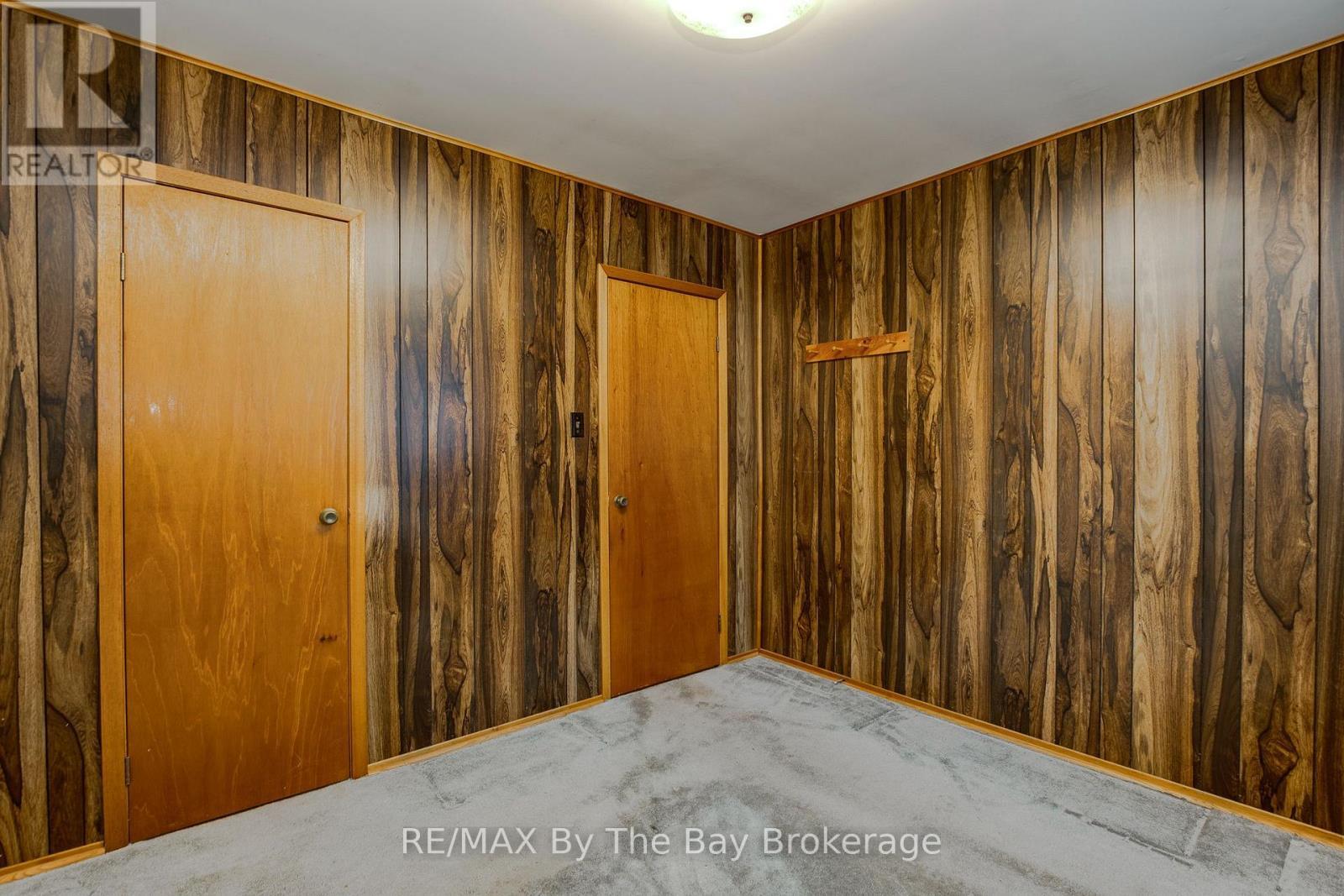 Bdm - 57 Tall Pines Drive, Tiny, ON - Indoor Photo Showing Other Room