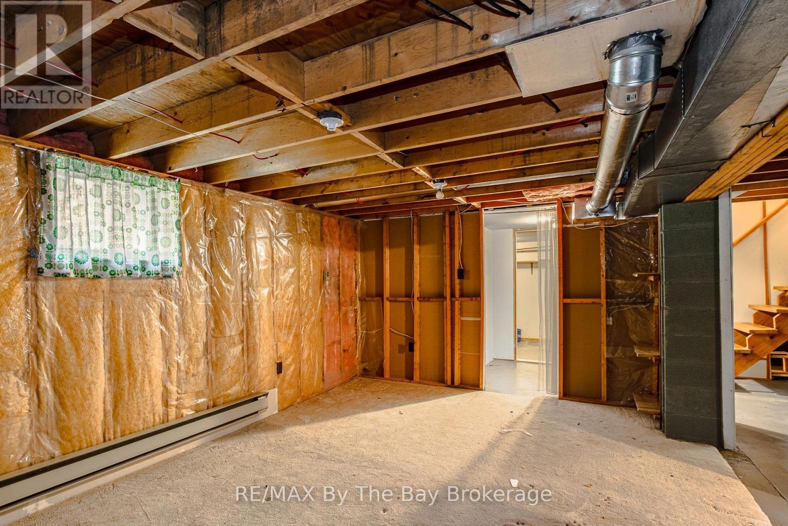bsmt - 57 Tall Pines Drive, Tiny, ON - Indoor Photo Showing Basement