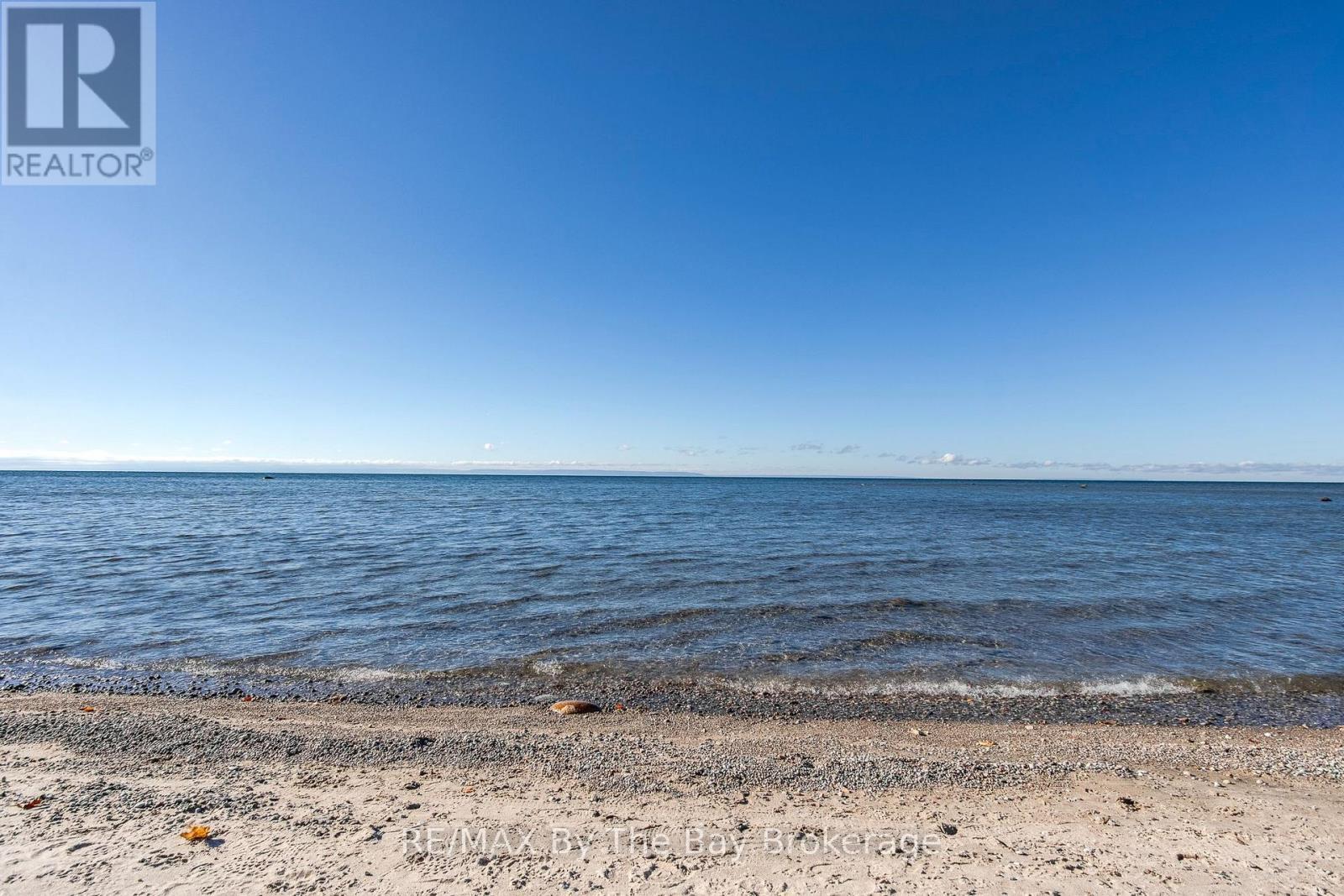 57 Tall Pines Drive, Tiny, ON - Outdoor With Body Of Water With View