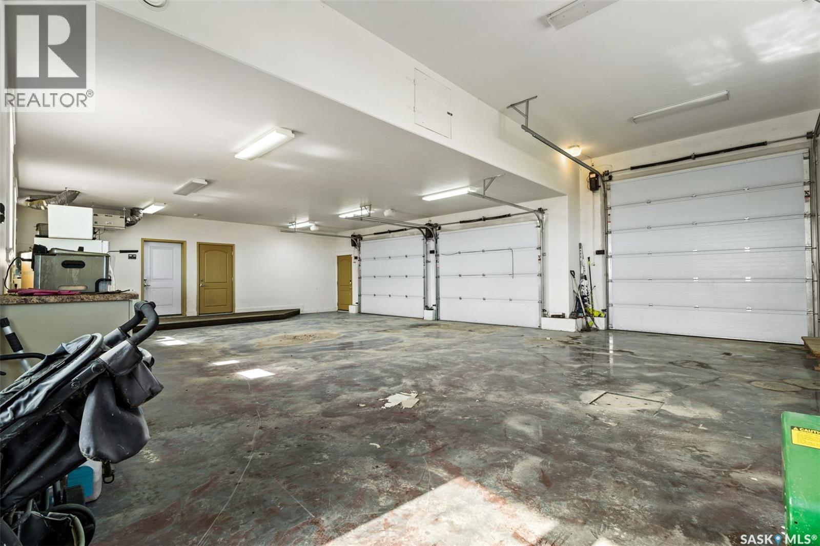 Kamsack Luxe Estate, Cote Rm No. 271, SK - Indoor Photo Showing Garage
