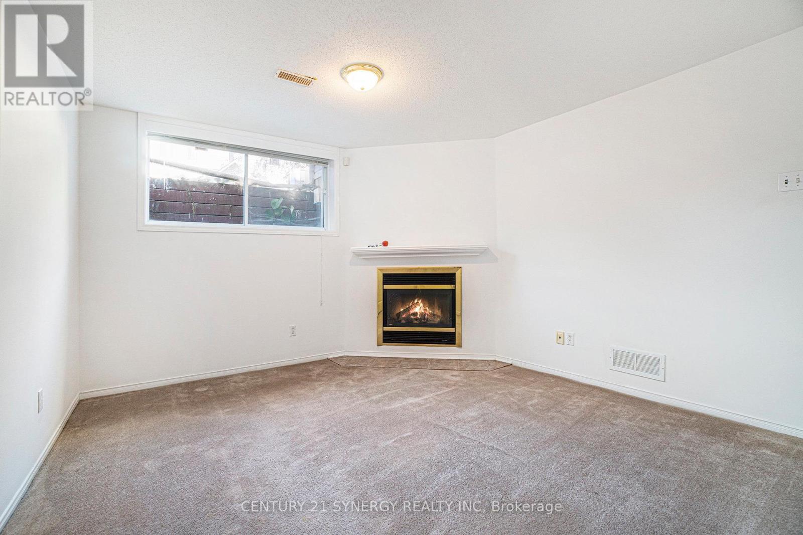 3 Villandry Street, Ottawa, ON - Indoor Photo Showing Living Room With Fireplace