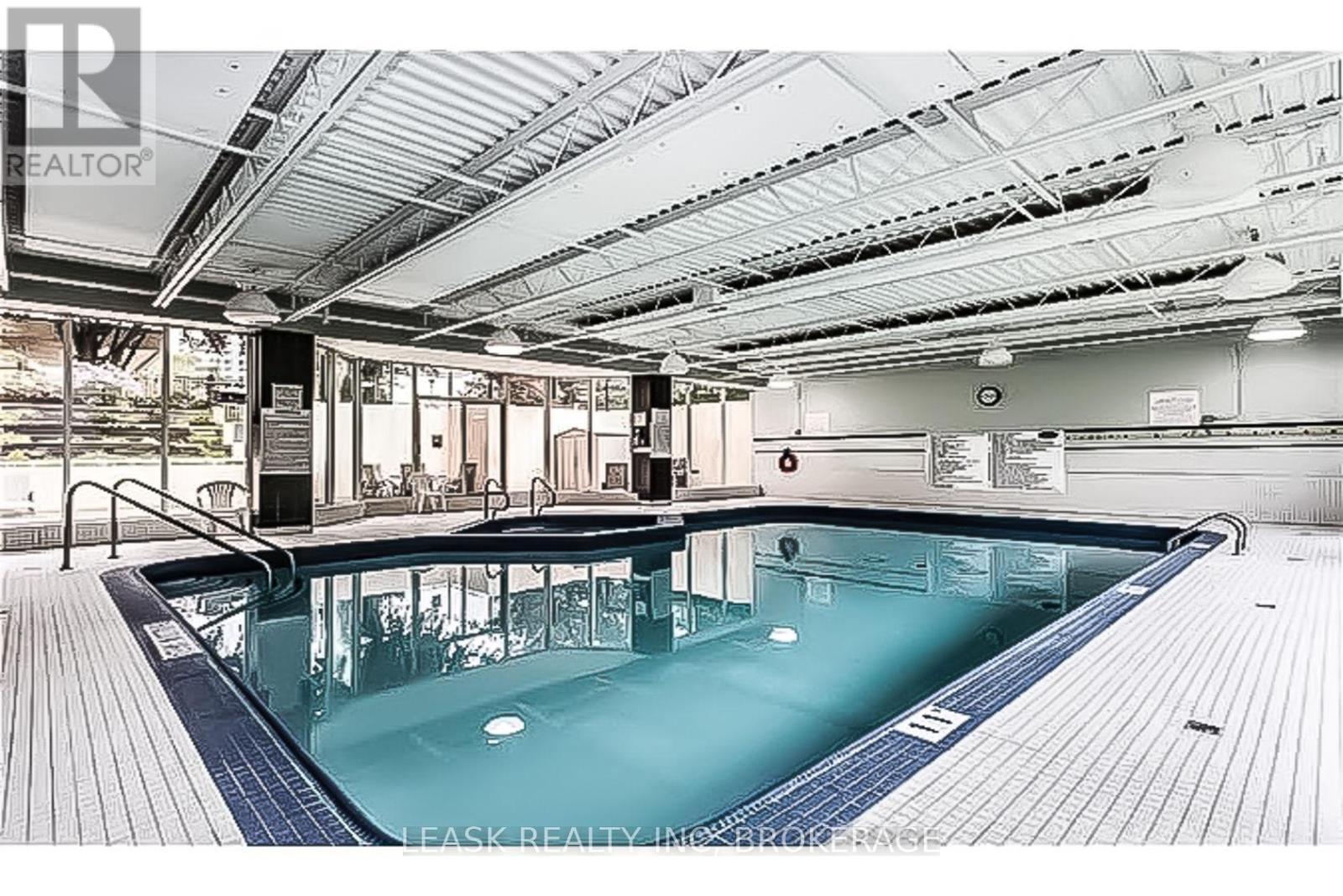Year-round wellness in indoor swimming pool. - 303 - 3 Towering Heights Boulevard, St. Catharines (Glendale/Glenridge), ON - Indoor Photo Showing Other Room