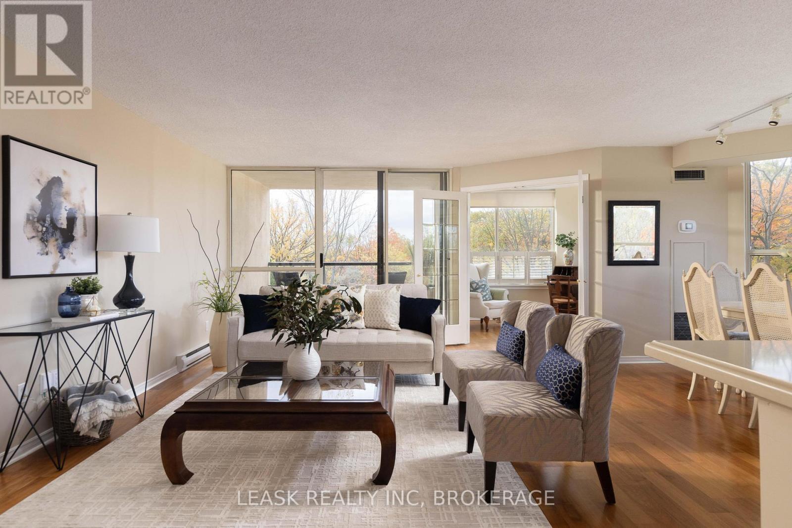 Seamless balcony access. - 303 - 3 Towering Heights Boulevard, St. Catharines (Glendale/Glenridge), ON - Indoor Photo Showing Living Room