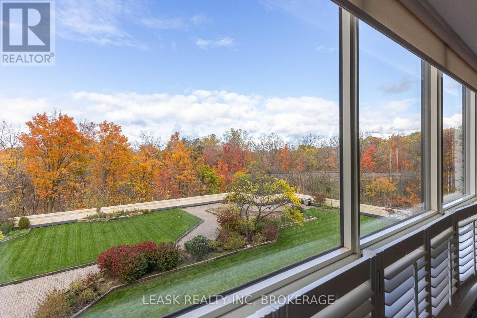 View from kitchen, surrounded by nature. - 303 - 3 Towering Heights Boulevard, St. Catharines (Glendale/Glenridge), ON -