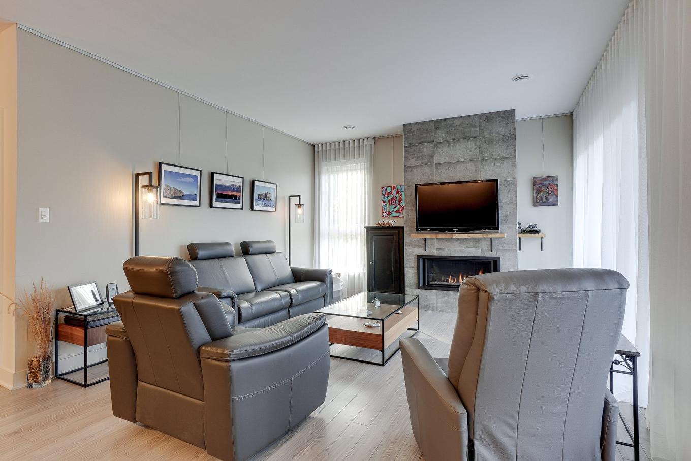Salon - 101-1195 Rue Marie-Gérin-Lajoie, Terrebonne (Terrebonne), QC - Indoor Photo Showing Living Room With Fireplace