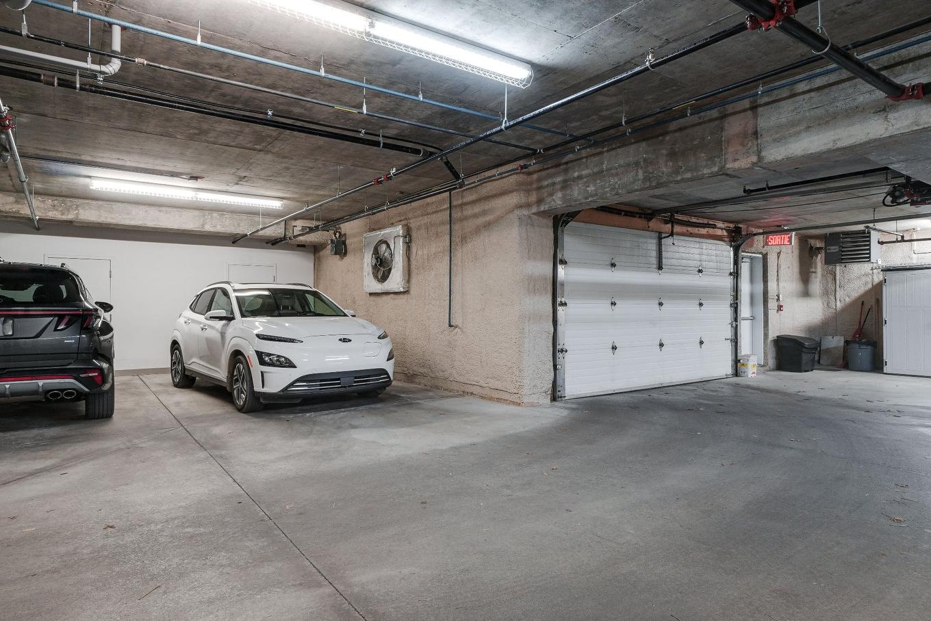 Garage - 101-1195 Rue Marie-Gérin-Lajoie, Terrebonne (Terrebonne), QC - Indoor Photo Showing Garage