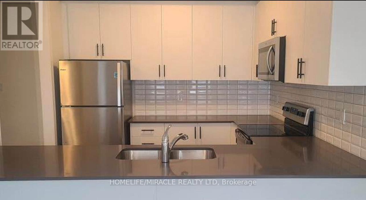 52 - 9450 The Gore Road, Brampton, ON - Indoor Photo Showing Kitchen With Double Sink