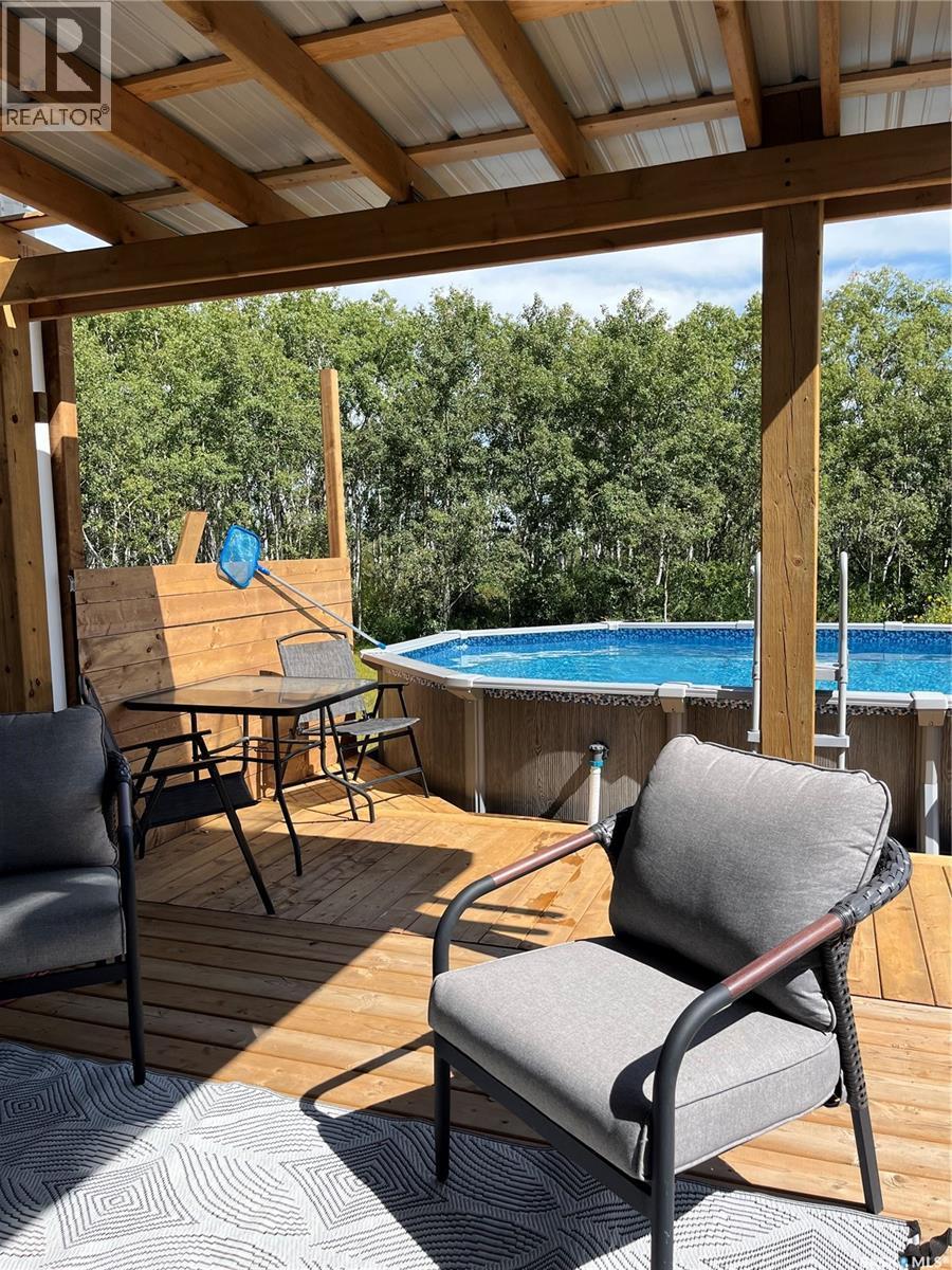 Furgeson Acreage, Corman Park Rm No. 344, SK - Outdoor With Above Ground Pool With Deck Patio Veranda With Exterior