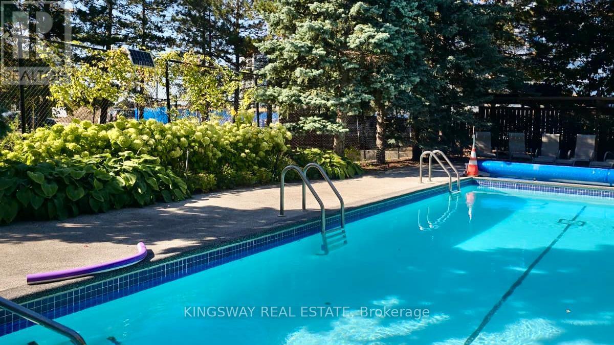 712 - 7420 Bathurst Street, Vaughan, ON - Outdoor With In Ground Pool With Backyard