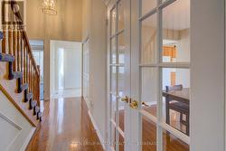 Hallway with Hardwood floor -