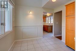 Tiled Breakfast Room next to kitchen -